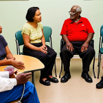 **

Diverse group of people participating in a focus group discussion about healthcare access in a low-income neighborhood. The scene includes elderly individuals, people of color, and individuals with disabilities. The setting is a community center, and the atmosphere is warm and empathetic. Focus on capturing the storytelling aspect of qualitative research.

**